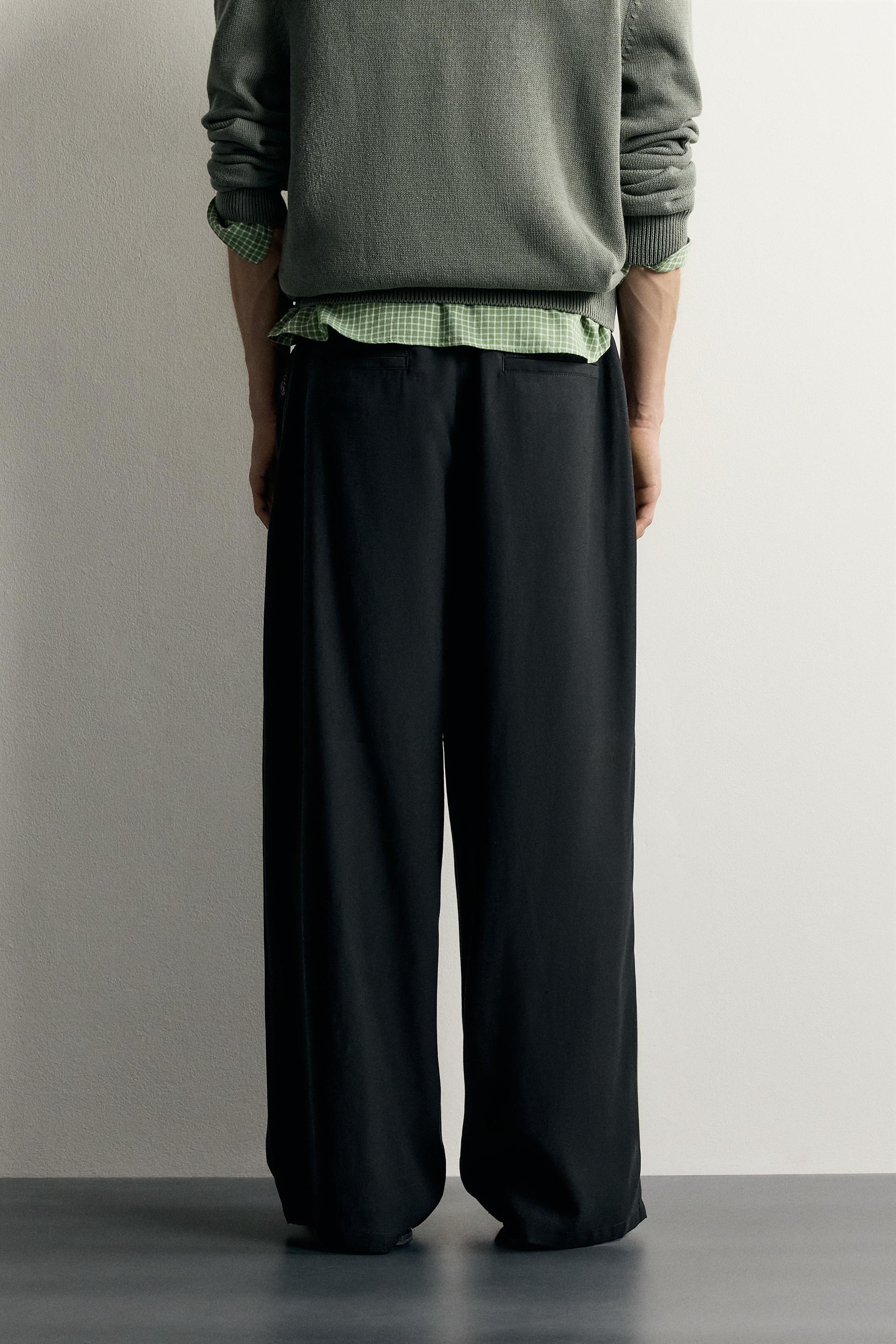 PLEATED FLUID TROUSERS